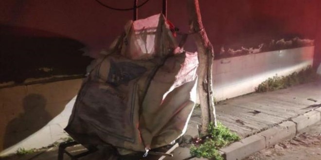 Polisten kaçan şüpheli, kağıt toplama çuvalına saklanırken yakalandı