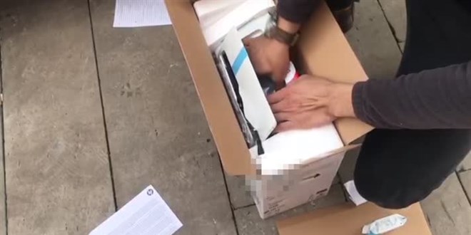 Adana'da yazıcılara gizlenmiş gümrük kaçağı 157 kol saati ele geçirildi