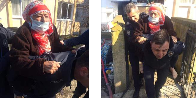 Polis, evde mahsur kalan yaşlı kadını yangından sırtında taşıyarak kurtardı