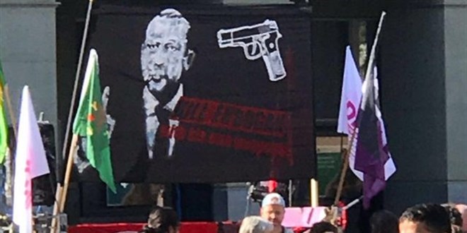 İsviçre mahkemesinden 'Erdoğan'ı öldürün' pankartı açanlara beraat kararı