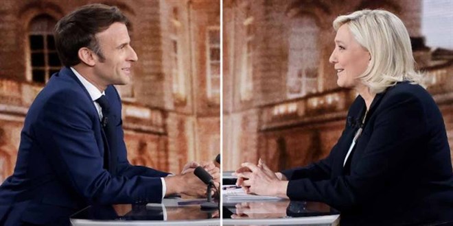 Macron ve aday Le Pen arasnda barts kavgas: Sava kar!