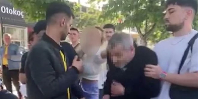Genç kadın, gizlice fotoğrafını çeken adamı yakalayıp önce yüzüne tükürdü sonra dövdü