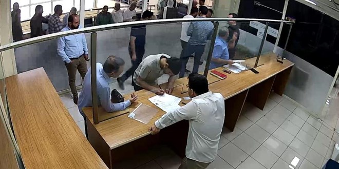 Tapuda 5 milyon liralık dolandırıcılığı memurun dikkati önledi