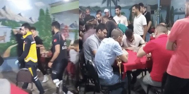 Nöbet geçiren adama aldırmadan okey oynamaya devam ettiler!