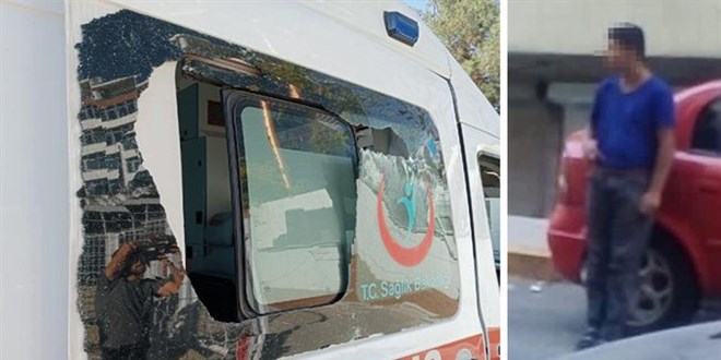 Kendisi için gelen sağlık görevlisinin kaburgasını, ambulansın da camını kırdı