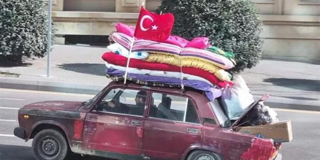 Bakü'den deprem bölgesine 'yorgan' getirdiler
