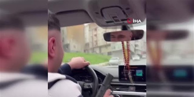 Şehir magandası aracının tavanından defalarca ateş etti