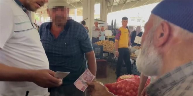 Sahte 10 bin lirayla pazara çıktı, esnaf yakaladı