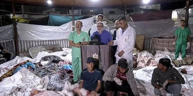 İsrail'in bombaladığı hastanede cenazeler arasında basın toplantısı