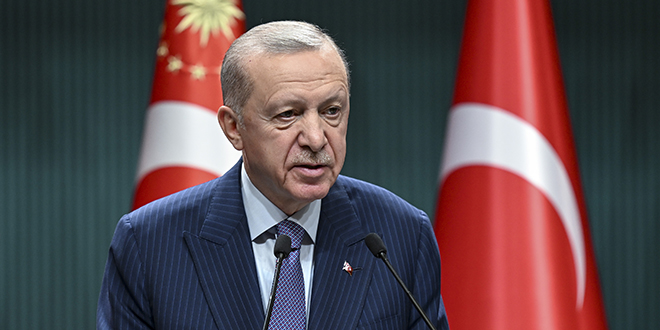 Cumhurbakan Erdoan aklama yapyor