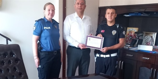 Kadına şiddet olayına müdahale eden polise başarı belgesi