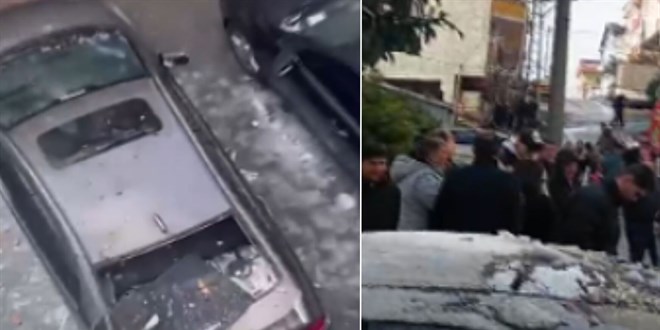 Yıldırım düştü! Binadan kopan parçalar araçlara zarar verdi