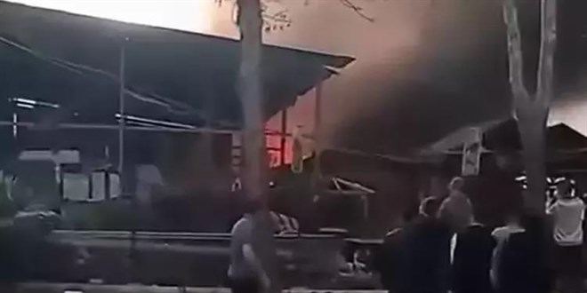 Yang�n yerinde g�venlik �nlemi alan polise sald�r�: 2 g�zalt�