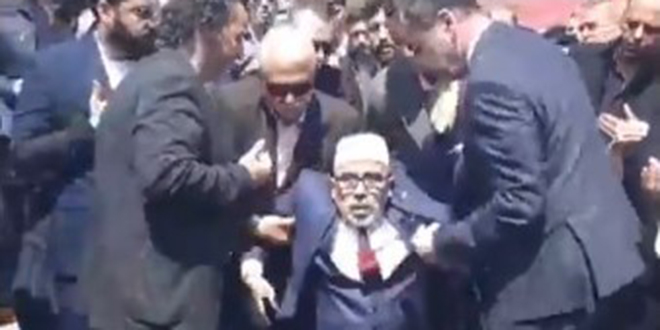 Türkeş'i anma programında dua eden imam bayıldı