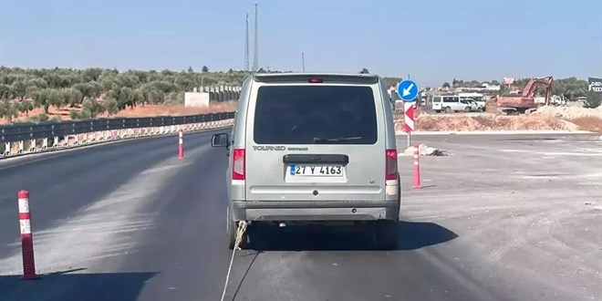 Köpeği aracının arkasında sürükleyen şahıs tutuklandı