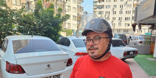 Otomobil sürücüsüne 'kask' cezası şoku