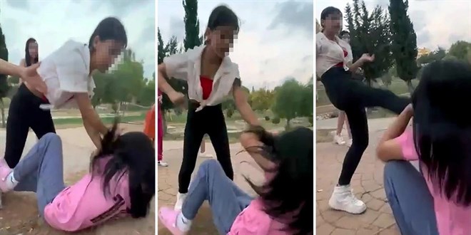 Tart��t��� k�z� tekme ve yumrukla d�v�p, sa��ndan tutarak s�r�kledi