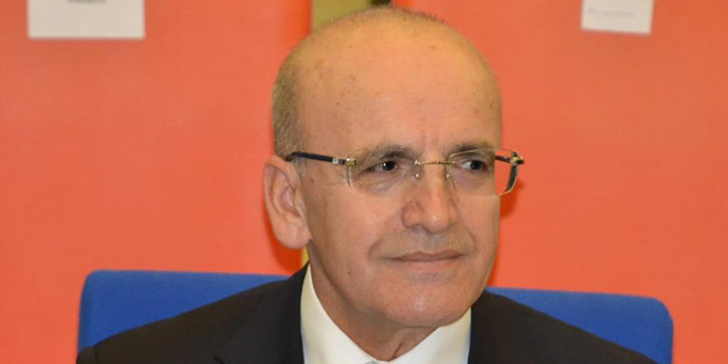 MHP'li Ersoy'un �nergesine Bakan �im�ek'ten 'mali ve sosyal haklar' cevab�