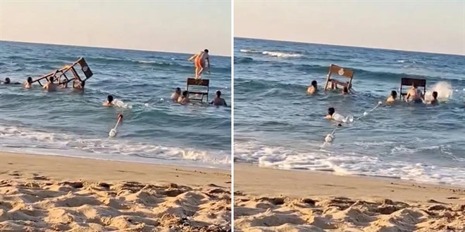 Plajda pes dedirten e�lence. Cankurtaran kulesini s�kt�ler - Son Dakika Haber