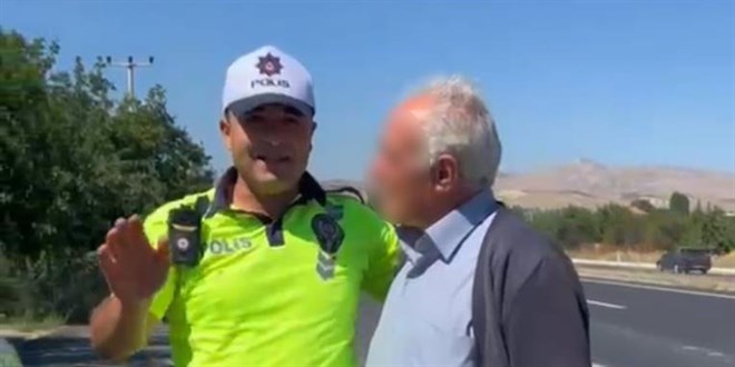 Ceza yememek i�in e�ini yolda indirdi, polisten 'evde bula��k y�kama cezas�' ald�