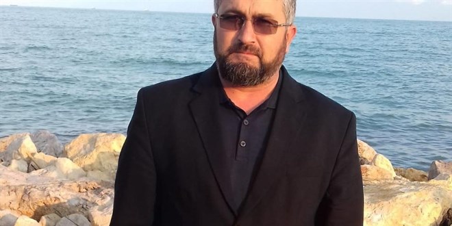 �mam, mezarl�kta �l� bulundu