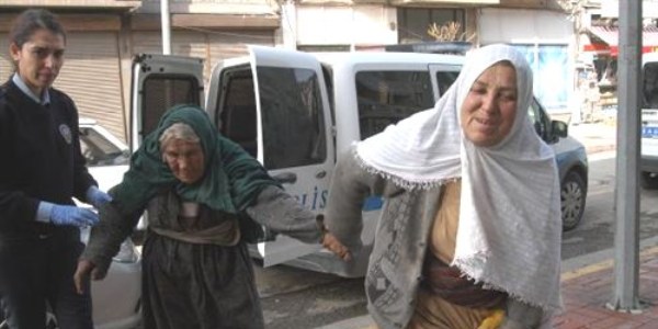 Caminin önünde dilenince ceza kesildi