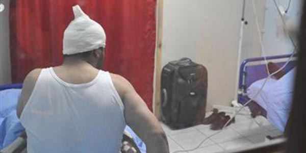 Kazada yaraland�, alt�n dolu valizi yan�ndan ay�rmad�