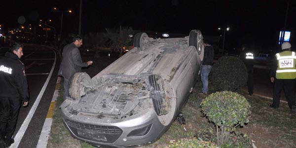 Takla atan araçtan burnu kanamadan çıktı