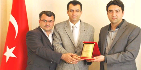 Baştabip Tufan'a plaket