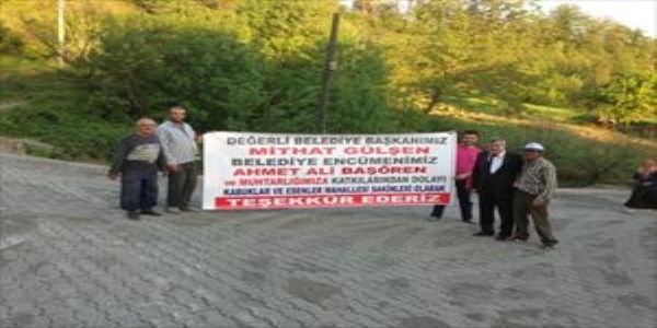 Mahalle sakinlerinden Başkan Gülşen'e afişli teşekkür