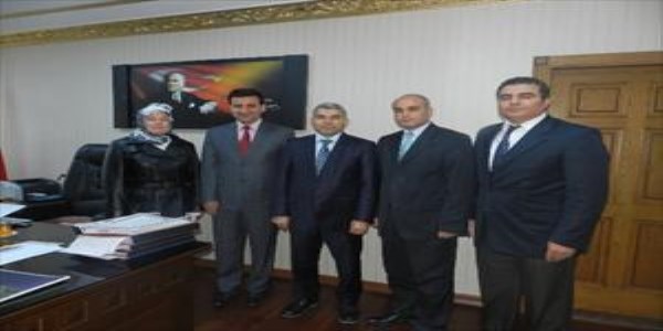�ki okul m�d�r� ve bir milli e�itim �ube �efine �st�n ba�ar� �d�l�