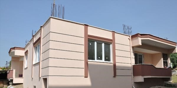 Ka�ak yap�yla m�cadele eden Nazilli'de dar gelirli ev sahibi oldu