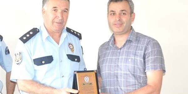 12 personel plaketle uğurlandı