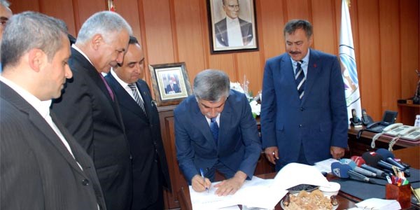 Bakan Erolu, belediye ile DS arasnda protokol imzalad