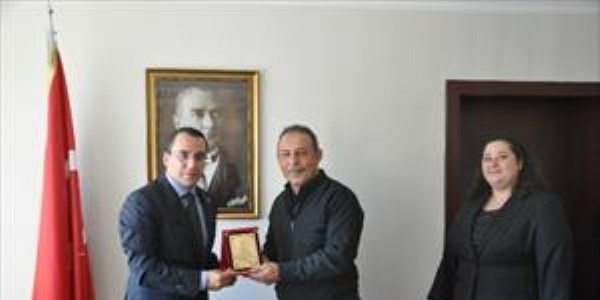 Spor yapan muhtara plaket