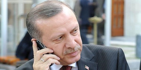 Cumhurbakan Erdoan iilerin ailelerini telefonla arad