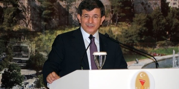 Davutoğlu: Başörtüsüne el uzatamayacaklar
