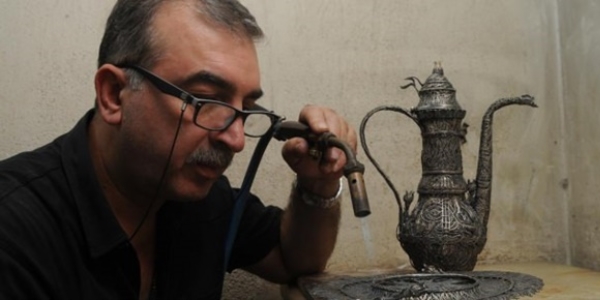 2 milyon gümüş parçayı ibrik ve leğene işledi