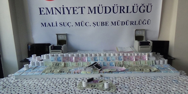 Sahte belge ve para basan şebekeye polis operasyonu