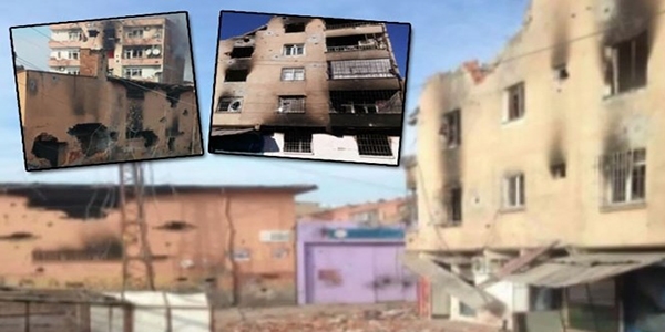 Teröristler kaçarken mevzilendikleri binaları yakıyor