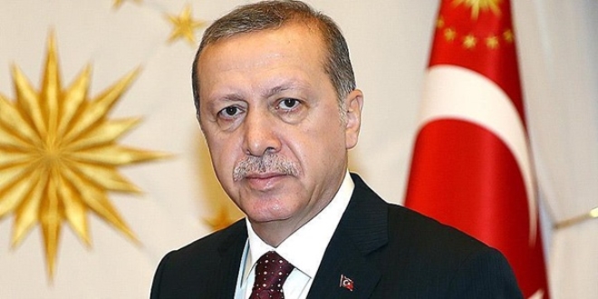 Cumhurba�kan� Erdo�an �ehit ailelerine ba�sa�l��� diledi