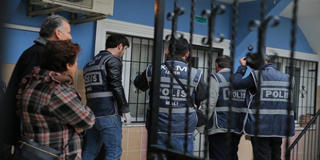'Gözaltına alınırken bilgisayarını pencereden attı'