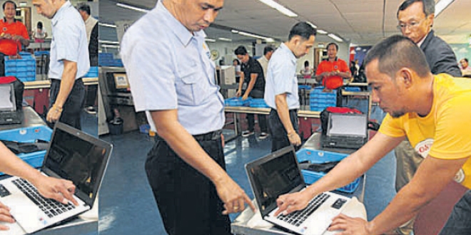 Havalimanlarında laptop kontrolü krizi
