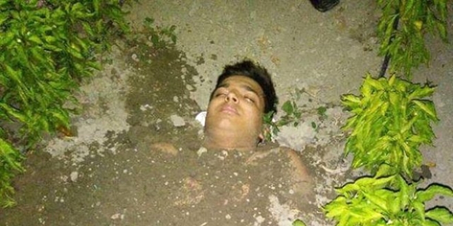 Elektrik ak�m�na kap�lan genci topra�a g�merek kurtard�lar