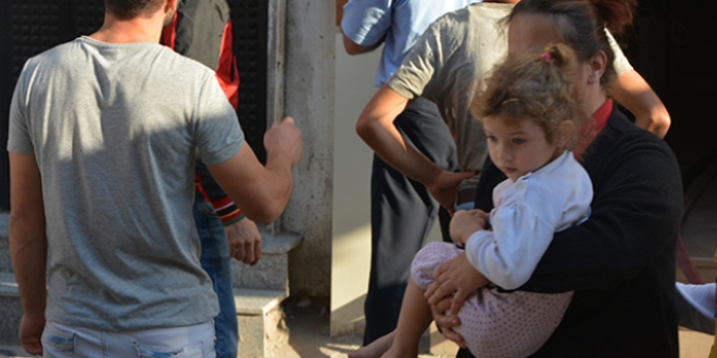 Yang�nda mahsur kalan �ocu�u itfaiye ekipleri kurtard�