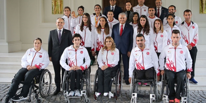 Yıldırım Rio'da madalya alan sporcuları kabul etti