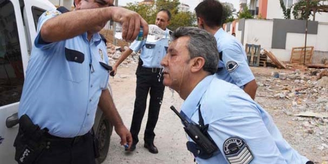 Gözaltına alınmamak için polisin yüzüne tiner döktü