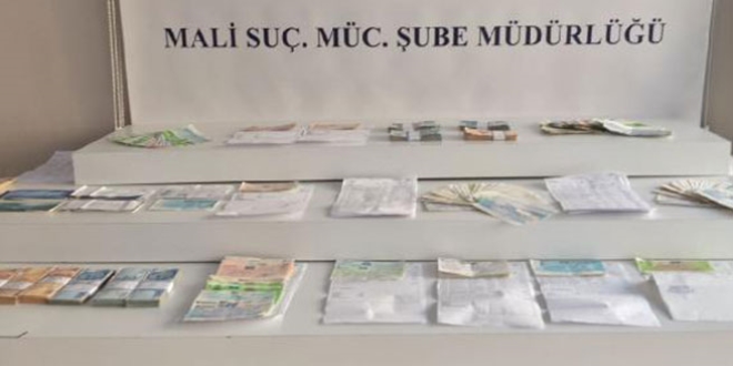 Kayyımdaki şirketin kasasını boşaltırken yakalandılar