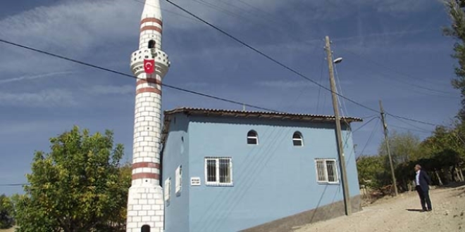 Cami 45 y�l sonra minareye kavu�tu