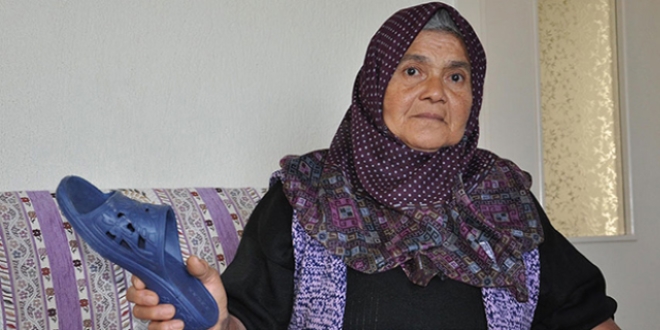 Oğluna attığı terlik 'silah' sayılan anneye ilk duruşmada beraat